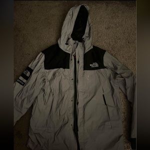 The north face x supreme raincoat